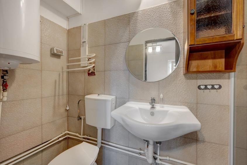 Casă individuală cu 4 camere cu Canalizare în Rahova