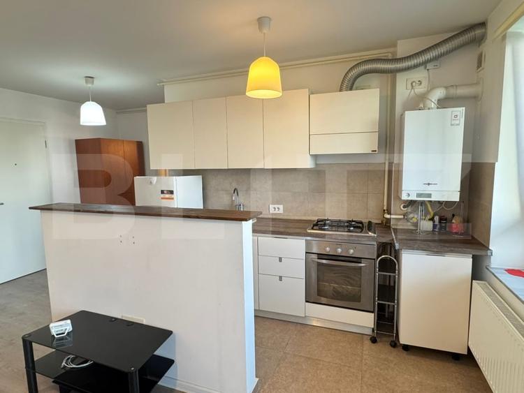 Apartament cu 2 camere semidecomandat, mobilat în Tractorul