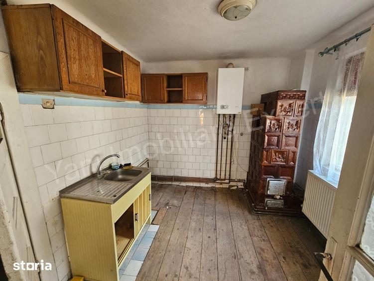 Casă cu 5 camere cu Teren 1672 Mp în Curtea de Argeș