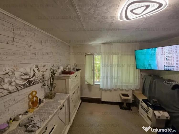 Apartament cu 3 camere semidecomandat în Calea București