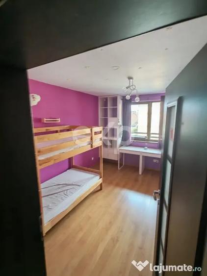Apartament cu 3 camere decomandat în Tractorul