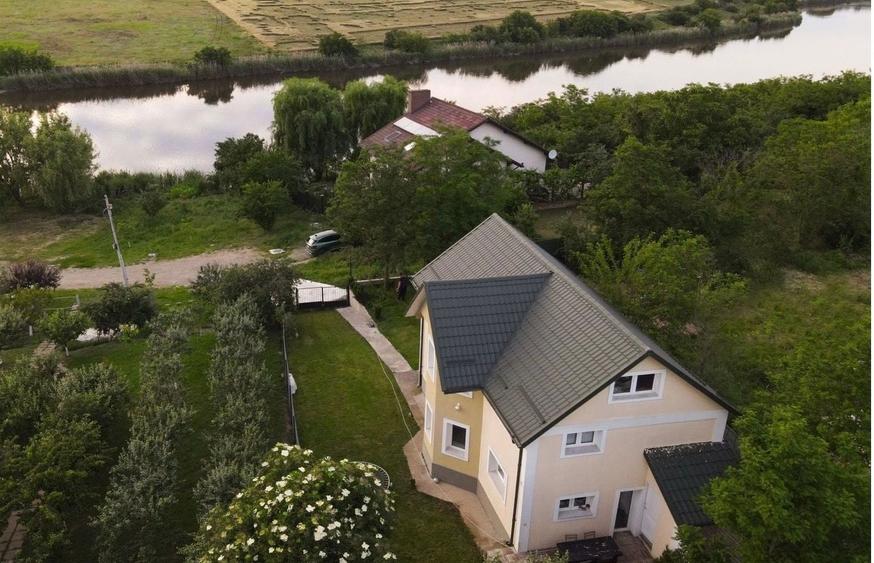 Casă individuală cu 4 camere cu Canalizare în Moara Vlăsiei