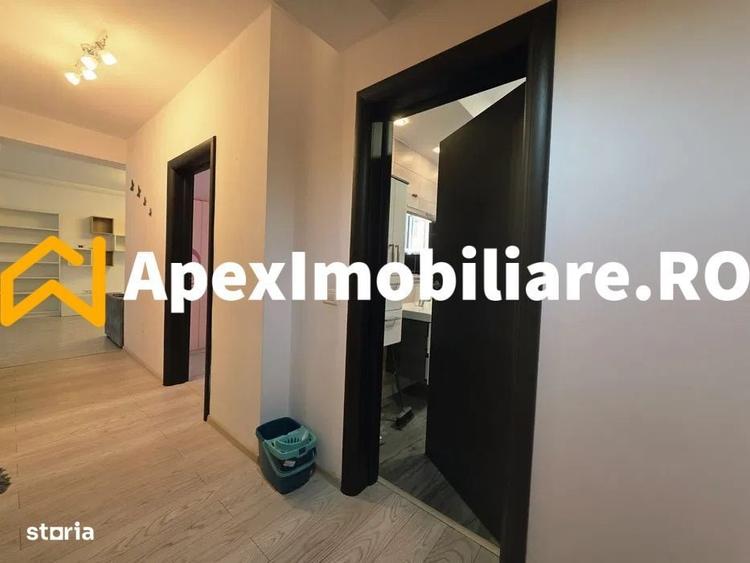 Apartament cu 3 camere decomandat în Roșu — fotografia 2