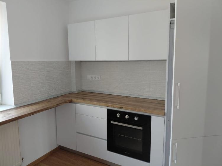 Apartament cu 2 camere semidecomandat, mobilat în Central