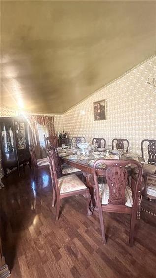 Casă individuală cu 7 camere cu Teren 660 Mp în Lazu