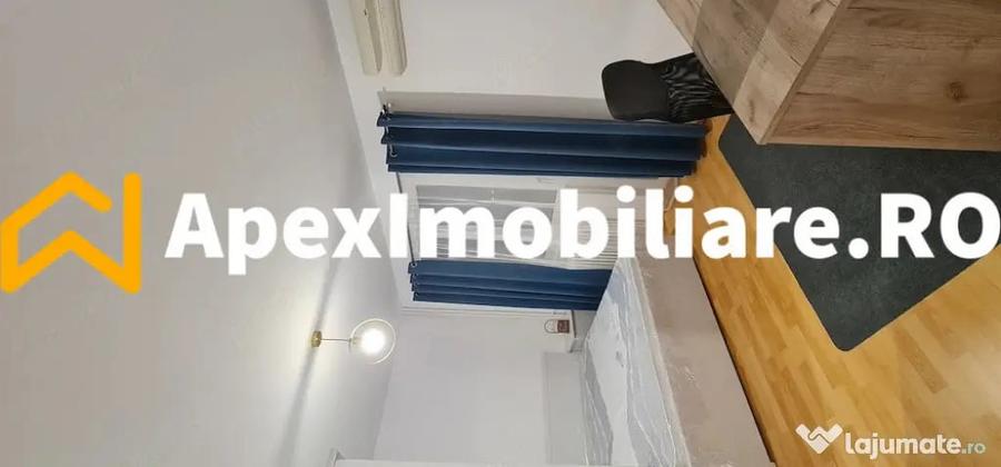 Apartament cu 3 camere semidecomandat în Gara de Nord