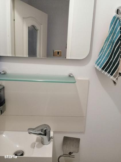 Apartament cu 3 camere în Romană