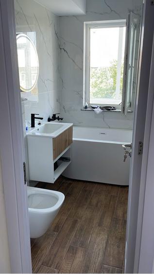 Apartament cu 3 camere decomandat în Lespezi