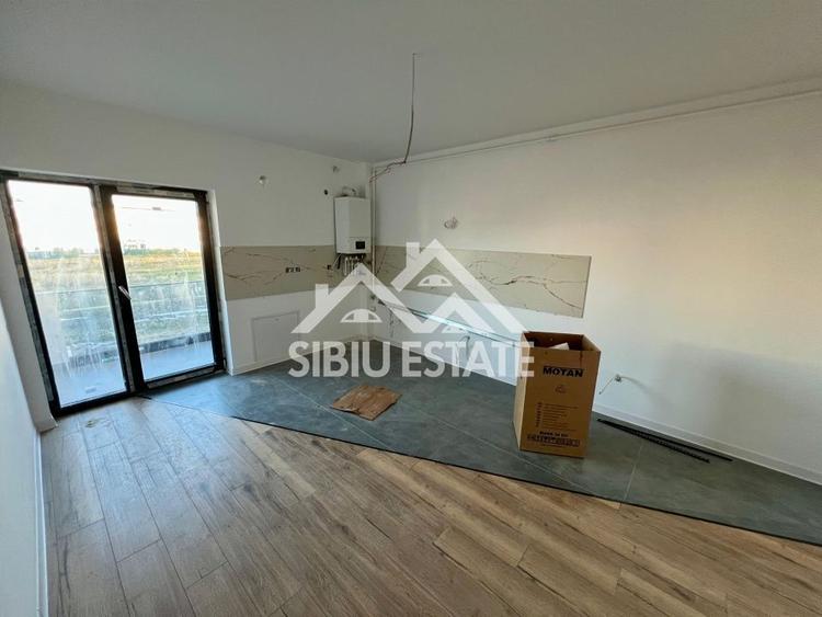 Apartament cu 3 camere decomandat în Șelimbăr — fotografia 1