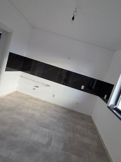 Casă individuală cu 4 camere cu Garaj în Holboca