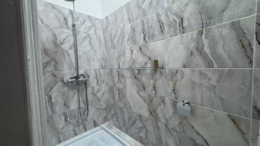 Apartament cu 15 camere circular în P-ța Unirii