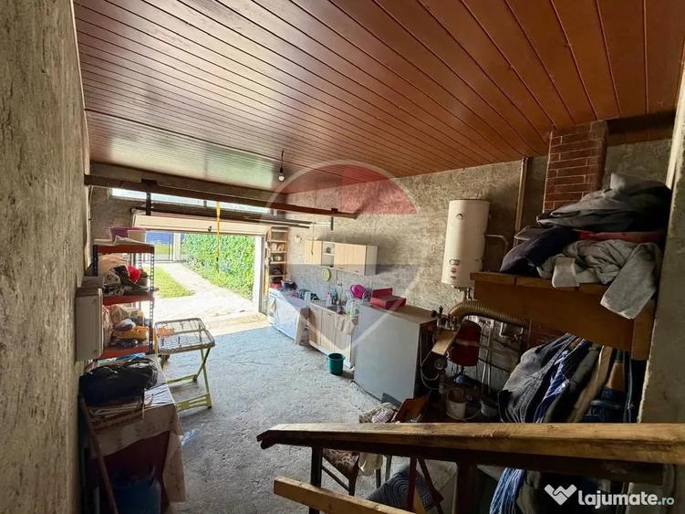 Casă cu 4 camere cu Teren 720 Mp în Vânători