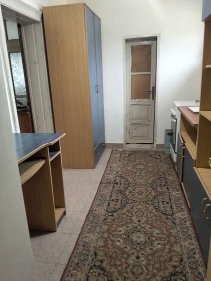 Casă cu 4 camere în Mârzănești
