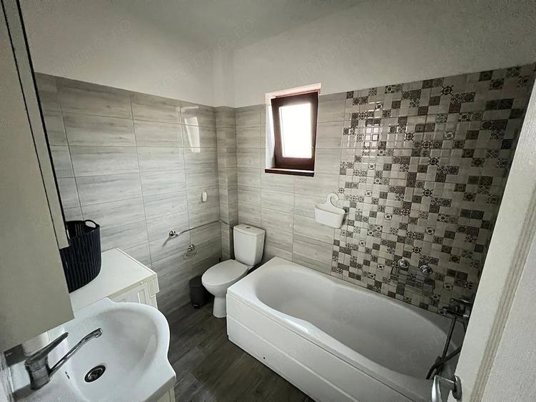 Apartament cu 3 camere semidecomandat în Giarmata