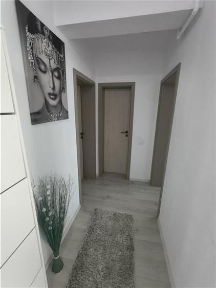 Apartament cu 2 camere decomandate balcon si loc de parcare etajul 1 - 12