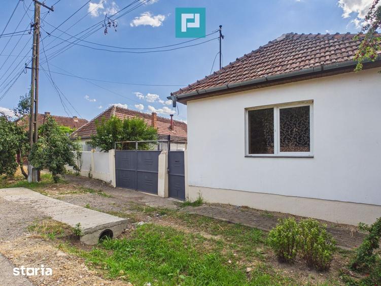 Casă cu 2 camere cu Teren 1000 Mp în Păuliș
