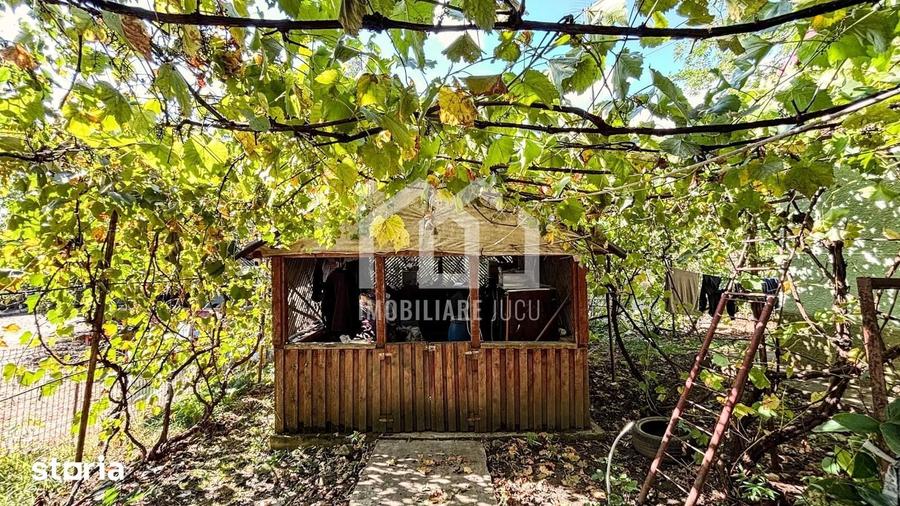 Casă cu 2 camere cu Teren 1200 Mp în Jucu