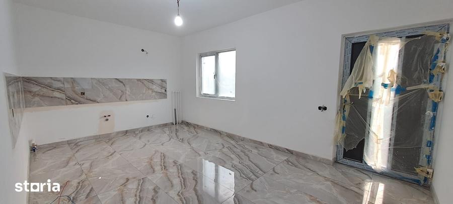 Casă cu 4 camere cu Teren 500 Mp în Dragomirești-Vale