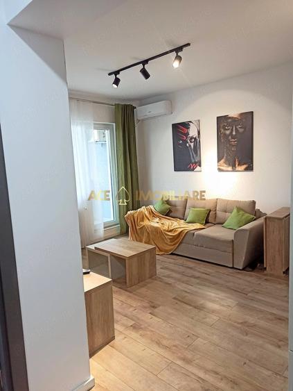 Apartament cu 2 camere semidecomandat, mobilat în Regie