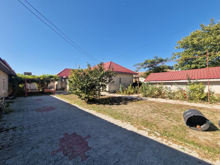 Casă cu 4 camere cu Garaj în Cogealac