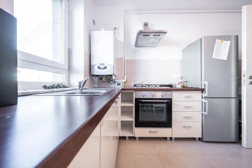 Apartament cu 2 camere decomandat în Tractorul