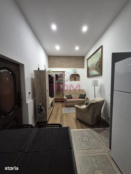Apartament cu 3 camere semidecomandat în Central