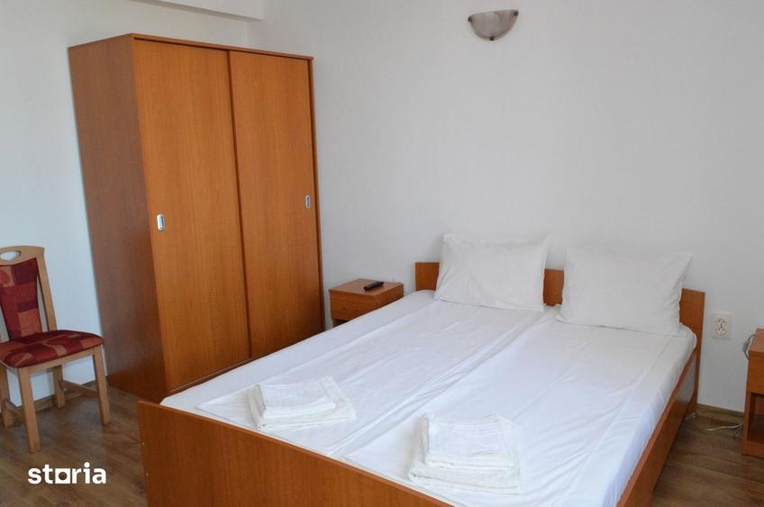 Casă cu 8 camere cu Teren 1200 Mp în Sânmartin