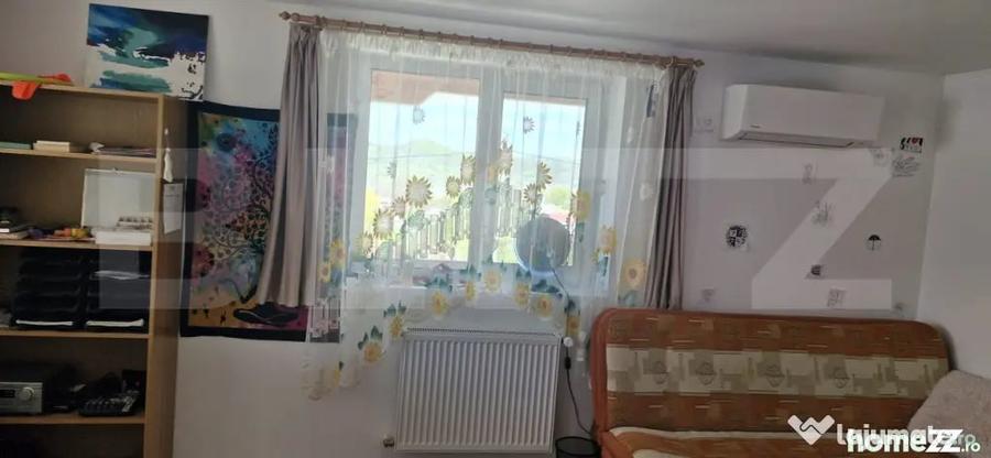 Casă cu 2 camere cu Teren 1000 Mp în Central