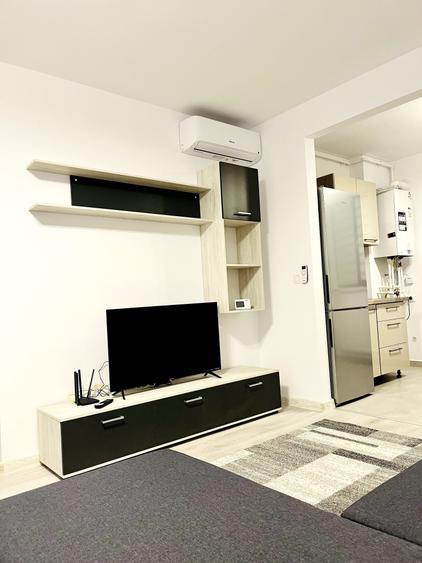 Apartament cu 2 camere semidecomandat în Cățelu