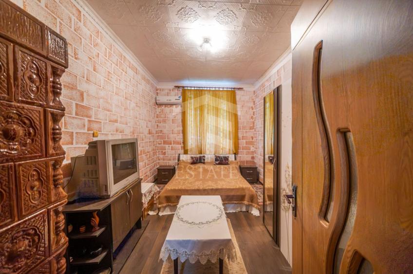 Apartament cu 3 camere semidecomandat, mobilat în Dâmbovița