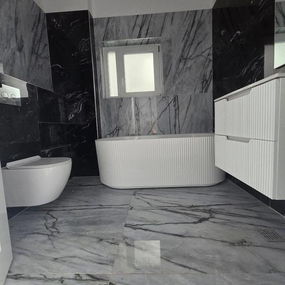 Casă cu 4 camere cu Teren 311 Mp în Tunari