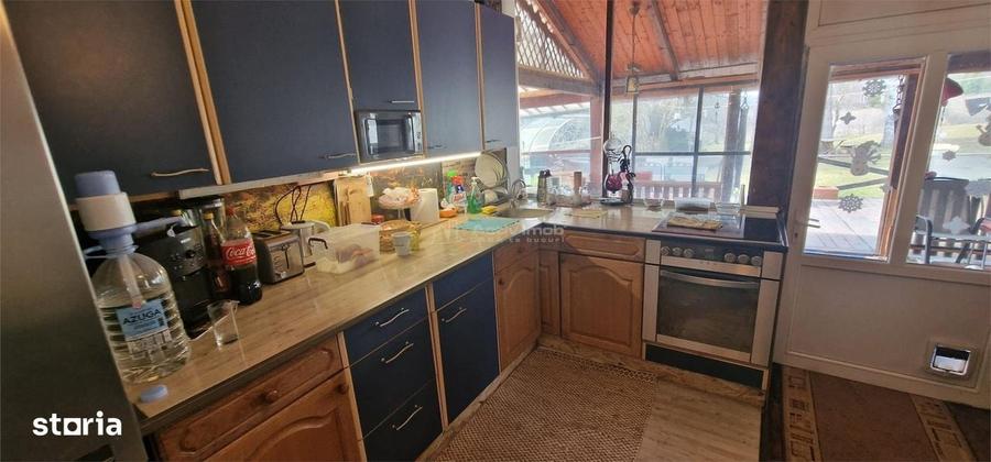 Casă cu 4 camere cu Teren 1400 Mp în Sud