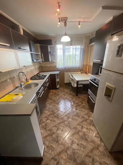 Apartament cu 4 camere decomandat în Ozana