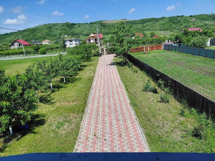 Casă cu Teren 1062 Mp în Oituz
