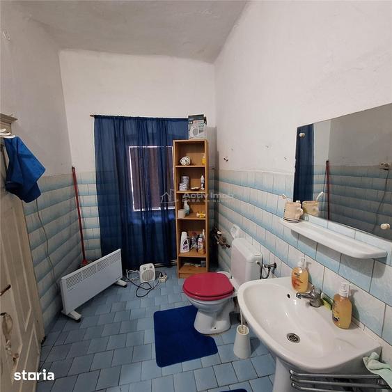 Casă cu 4 camere cu Teren 1000 Mp în Central