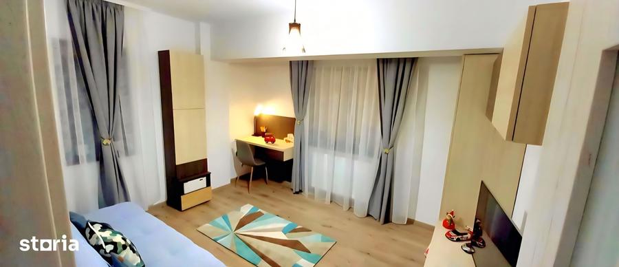 Apartament cu 2 camere decomandat în Tractorul