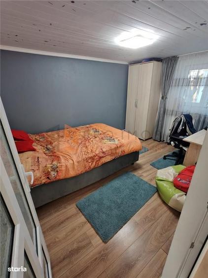 Casă cu 4 camere decomandat în Căpățânești
