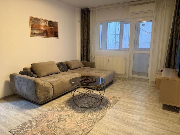 Apartament cu 2 camere semidecomandat, mobilat în Olteniței