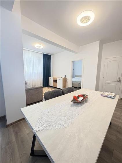 Apartament cu 2 camere semidecomandat, mobilat în Km 5