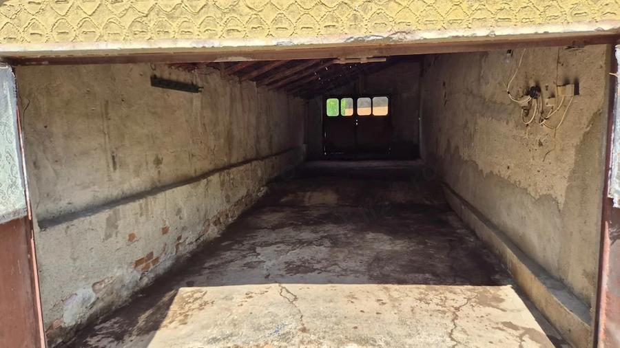 Casă cu Teren 1464 Mp în Plopșoru