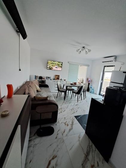 Apartament cu 2 camere semidecomandat, mobilat în Central