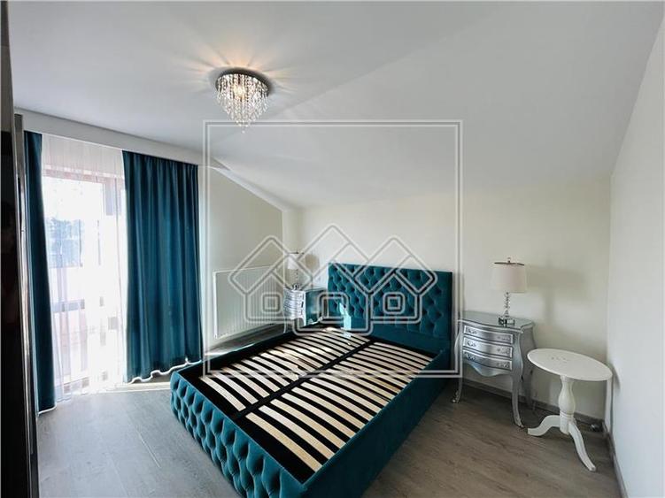 Ap pe 2 niveluri, 75 mp utili + 2 balcoane, mobilat modern - 13