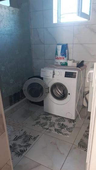 Casă cu 5 camere cu Teren 1000 Mp în Nana