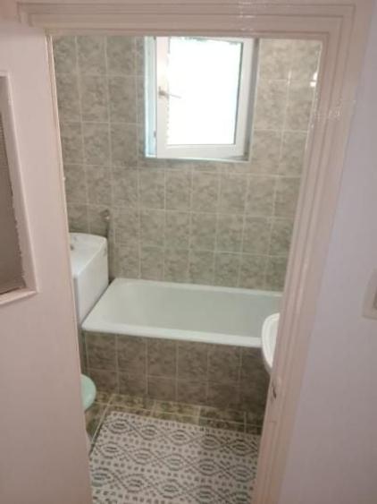 Apartament cu 3 camere semidecomandat, mobilat în Titan