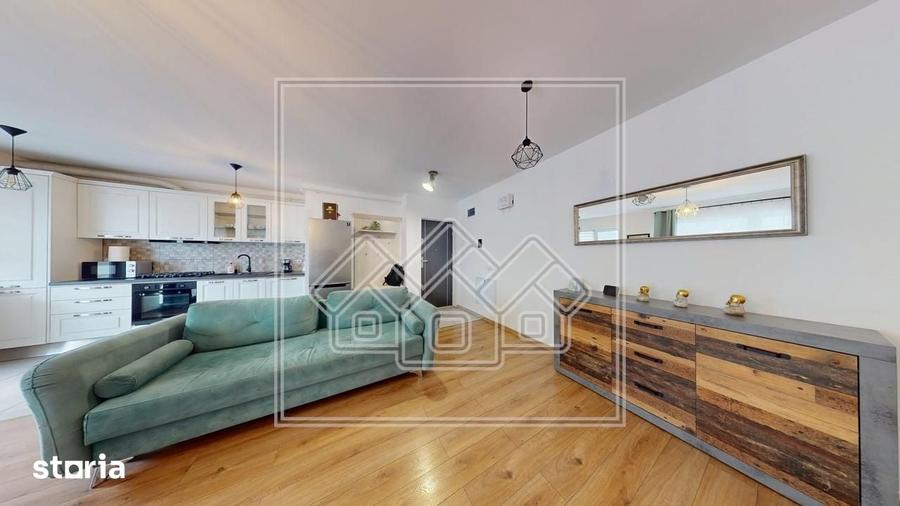 Apartament modern, cu 3 camere, balcon mare, loc de parcare inclus - C - 7