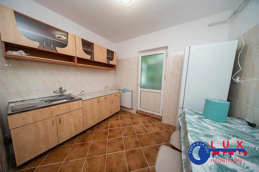 Apartament cu 3 camere decomandat în E3