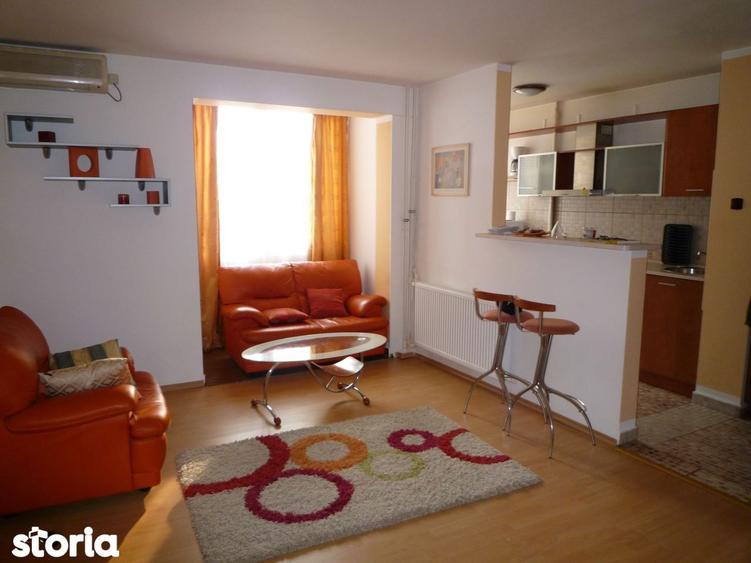 Apartament cu 2 camere, mobilat în Romană
