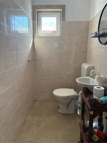 Casă cu Teren 1000 Mp în Central