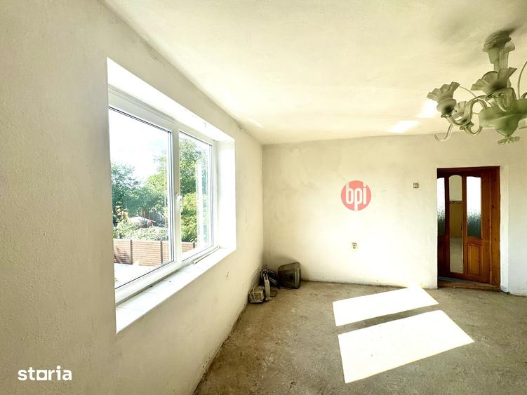 Casă cu 4 camere cu Teren 1200 Mp în Fălticeni