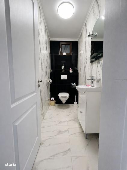 Casă cu 4 camere în Sânmartin